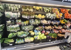 Lovely but labor-intensive presentation of vegetables in the refrigerator.