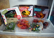 Microwave-ready pimentos and tomatoes, and bright snack bell peppers at the Campos de Granada booth.