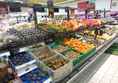 Some products in their 'own' boxes, others in green crates.