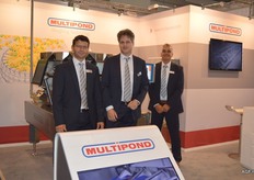 Multipond team Helmut Bienlein, Frank Caris and Jos van Ganzewinkel in front of the ultra-hygienic, waterproof J weigher with its transfer system for a top seal tray line. The word hygiene is a keyword for the new J generation, 14-heads multihead weigher.