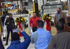 Cutting the ribbon to declare the packhouse open