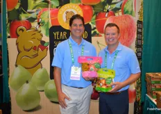Don Roper and Craig Arneson with Honeybear Brands proudly show pouch bags of organic Pink Lady and Honeycrisp apples. 