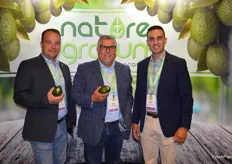 Kraig Loomis, Dan Acevedo and Brian Gomez with GreenFruit Avocados show avocados from Colombia. 
