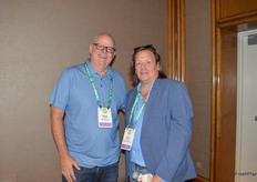 Robb Myers with CMI Orchards and Brett Burdsal with Dayka & Hackett in a conversation on the show floor. 