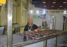 Satis Sorumlusu of Söker. They showcased their entire port harvesting line, Sorumlusu is standing next to a washer. 