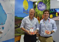 Tasmanian company Harvest Moon grow a whole range of vegetables and have launched Snackables, a ready to eat carrot pack. Mark Kable and Giancarlo Cassinelli.