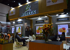 The gentlemen on the Agreen stand in meetings.