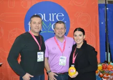 Jamie Moracci, Chris Veillon, and Tiffany Sabelli with Pure Flavor. Tiffany shows the company's latest melon, Alonna. 