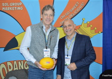 Brian Slagel and Mark Cassius with Sol Group Marketing proudly talking about different melon varieties. 