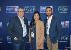 Mayra Vazquez with Latin Specialties is walking the floor and flanked by Dan Acevedo and Giovanni Espinosa of GreenFruit Avocados.