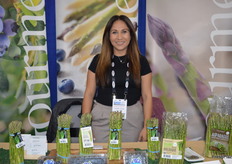 Adriana Fortune with Gourmet Trading Company has asparagus and blueberries on display.