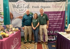 Mark Kreiner, Meghan Klotzbach, and Tom Leo with Mother Earth Organic Mushrooms. 