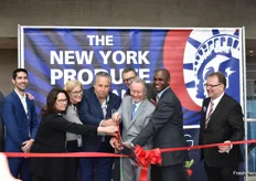 Ribbon-cutting signifies the official opening of the New York Produce Show.
