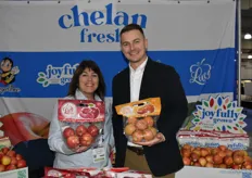 Denise Hinkley and Eric Martinson with Chelan Fresh proudly show Lucy Rose and Lucy Glo apples. Washington is faced with a large apple crop this year.