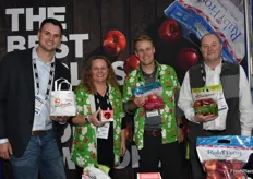 Proudly showing SnapDragon and RubyFrost apples from New York are James Williams with United Apple Sales, Jessica Wells and Joel Crist representing Crunch Time Apple Growers, and Brett Baker with United Apples Sales.