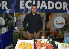 Francisco Bonilla with Gran Fruta from Ecuador has dragon fruit on display.