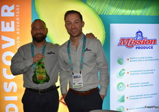 Hector Soltero and Galen Johnson with Mission Produce show mini avocados in a mesh bag.