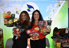 Having fun with apples CMI Orchards has lots of different varieties to offer. Proudly shown by Ellie Tucker and Danelle Huber.