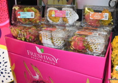 Dragon fruit in clamshells.