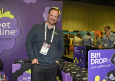 Robert Penna with Alpine Fresh in front of a Sweet Karoline blackberry display.