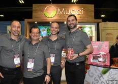 Ken Paglione, Troy Gage, Tyler Jones, and Stephen Cowan with Mucci Farms show Savorries Tomatoes.