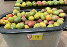 Imported mangoes on special in this unusual display bin.