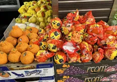 Specialty citrus on display including mandarins in packaging but without the gift box.