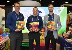 Max McGuire, Loren Foss and Aaron Huston with CMI Orchards are showing pouch bags with Ambrosia apples. Both conventional and organic Ambrosias are available year-round.