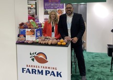Jacy Barnes Clapp and Pepe Calderon with Farm Pak have a nice display of North Carolina grown sweet potatoes. 