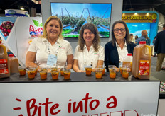 Riveridge Produce Marketing’s Kari Soldaat, Trish Taylor and Marilyn Heerren hand out samples of the company’s apple cider.