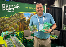 Ben Antongiovanni of Pure Palm Dates with two of the company’s packaged date products.