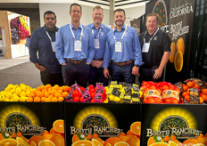 The Booth Ranches, LLC. team behind an array of its citrus.