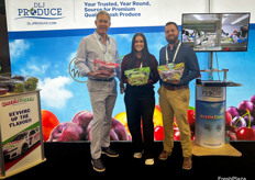 DLJ Produce’s John Zaninovich, Cristin Coombs, and Dustin Clyde show off the company’s Razzle Dazzle grapes.