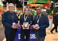 Ray Wowryk, Kailey Foster and Shreenivas Shellikeri with Nature Fresh Farms are showing the company's new Devours tomato line.