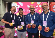 Richard Goodman, Ray Pena, Ricardo Roggiero and Jose Roggiero with Freshway Produce have different types of dragon fruit as well as guava in clamshell on display.
