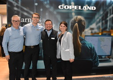 The team at Copeland is proud of their booth, which is made with sustainable materials. From left to right are Gerd Uitdewilligen, Dan Knauer, Daniel Cobos, and Megan Pavik.