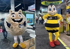 The apple mascots were busy bees working the show.