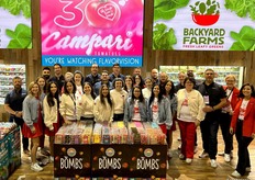The Mastronardi team behind a colorful array of fresh produce.