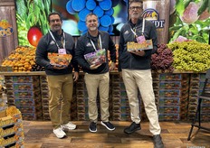 Brandt Farms' Michael Reimer, Darrin Kirk and Dave Maddux showing off some of the company’s product line.