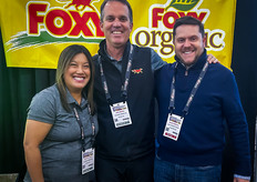 L-R: The Nunes Company Inc.'s Stephanie Cantero and John Amaral get a visit from Blair Greenhill of Nickey Gregory Co.