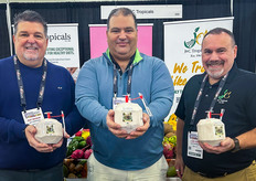 Hydrating with coconut water at J&C Tropicals' booth. L-R: Ray Mason, Adrian Capote and Luis Vega.