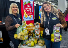 Michele Youngquist and Lindsey Lance of Bay Baby Produce holding up bagged squash from their product line.