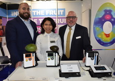 Galen George, Ivonne Chica, and Leonard Felix show a selection of the fruit quality meters and ethylene measuring tools from Felix Instruments.