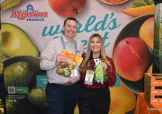 Ben Harmon and Stephanie Torres with Mission Produce proudly show mangos and avocados.