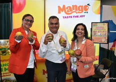 Maria Lovera, Ramon Ojeda and Lavanya Setia with the National Mango Board proudly show mangos from Mexico.