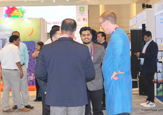 Delegates catch a quick word with Zac Bard of Westfalia Fruit between the conference sessions.