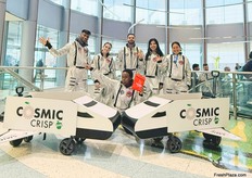 Show attendees happily took Cosmic Crisp apples from the Washington Apple Commission’s astronauts.