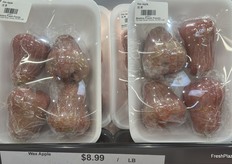 The fragile wax apples are packaged tight and sold as a foursome.