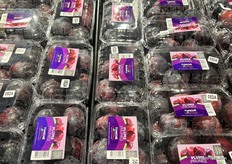Clamshells of Chilean plums.