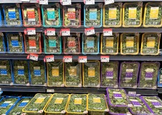 …a wall of private label leafy green and salad blends.